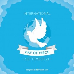 Blue peace day background with white dove