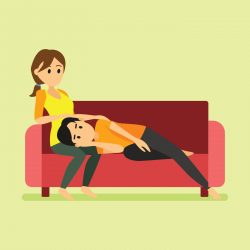 A man laying on her girlfriend thigh