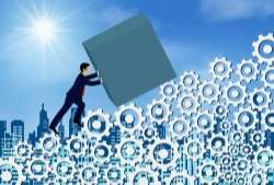 Businessmen push forward the concrete up the slope on gear ladder