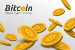 Golden Bitcoin sign on white background